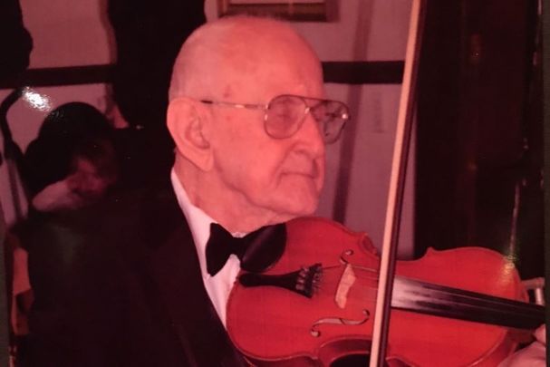 Bill McEvoy playing fiddle